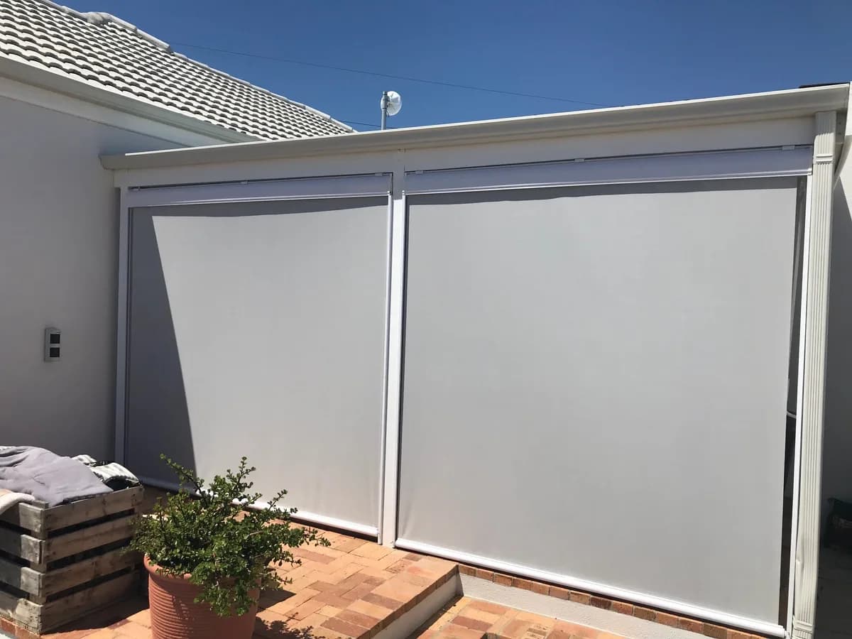 Outdoor drop blind closed on a patio
